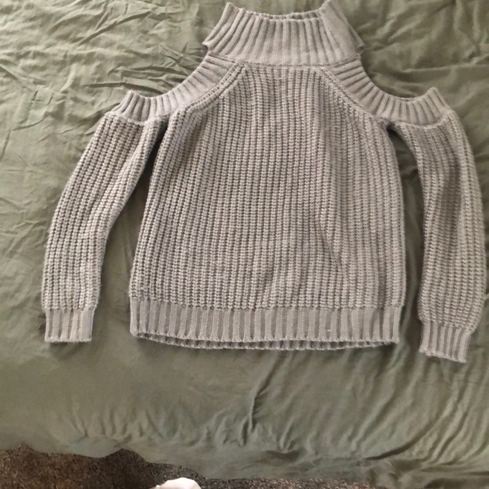 Large gray knit sweater with cold shoulder cut outs